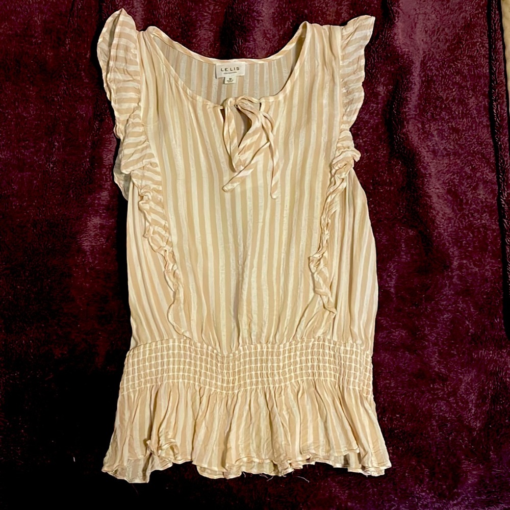 Stripped blouse, tan and cream in color. Size medium